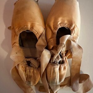 Well worn pointe ballet shoes